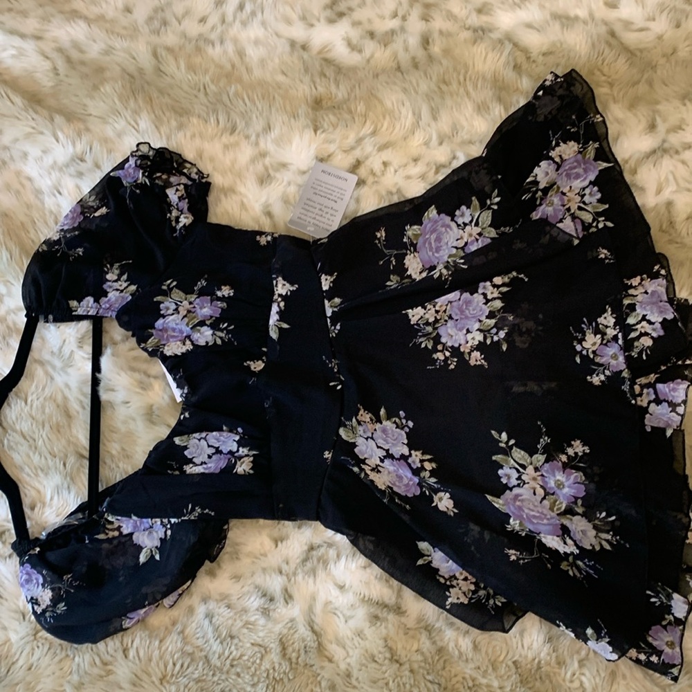 NWT floral romper. Lightweight and frilly, perfect for a summer or spring outing